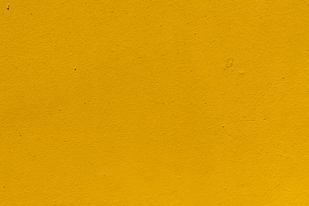 close-up view of yellow weathered rough wall texture - Фото, зображення