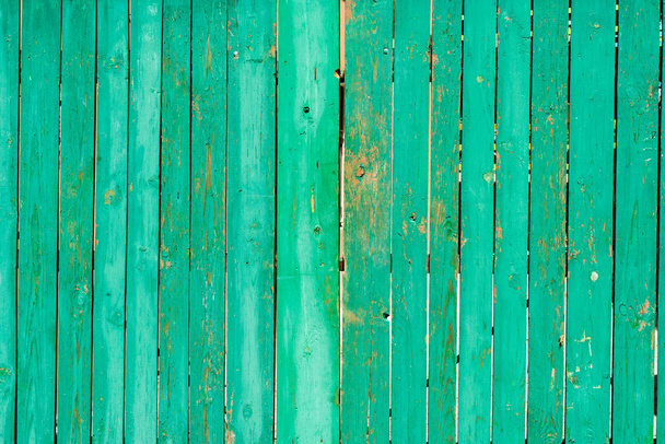old scratched green wooden fence background - Photo, Image
