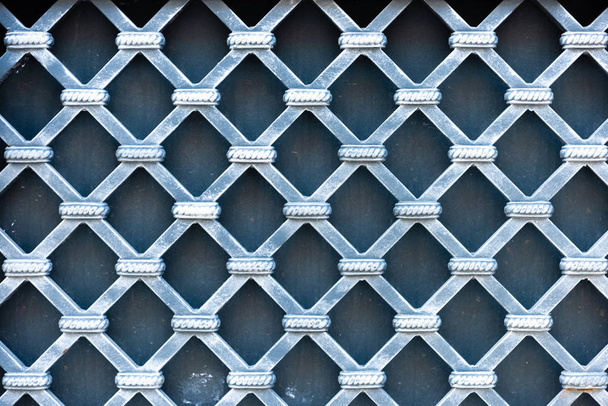 close-up view of creative decorative pattern, blue background - Foto, imagen