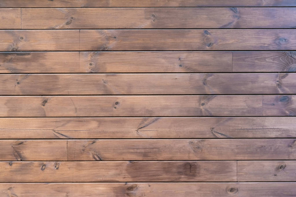 close-up view of brown hardwood background with horizontal planks - Foto, Bild