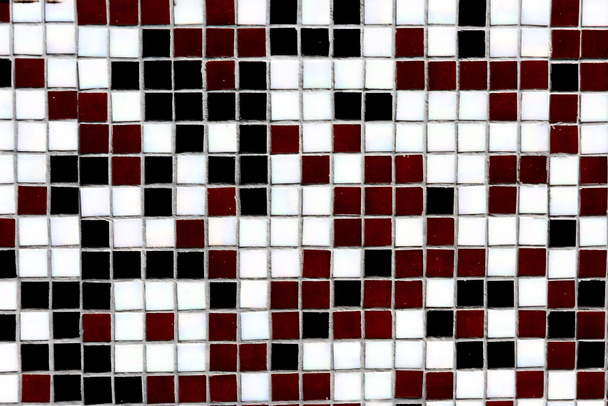 close-up view of black, white and maroon decorative tiles background  - Fotó, kép