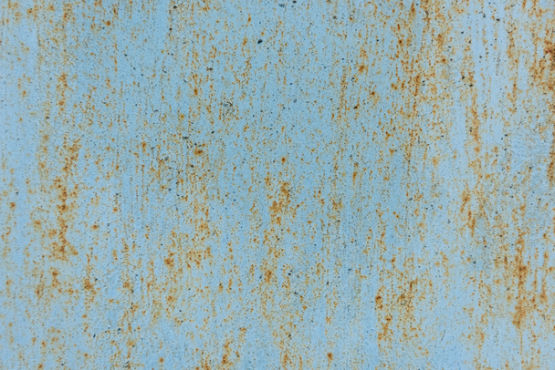 close-up view of old scratched blue wall with rust background - Foto, afbeelding