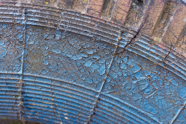 close-up view of old blue weathered tyre background - Foto, afbeelding