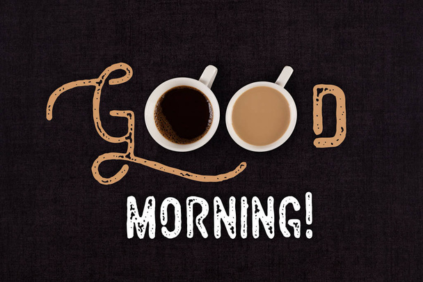 Günaydın iki fincan kahve yukarıdan ile siyah tabloda metin, düz yatıyordu. - Fotoğraf, Görsel