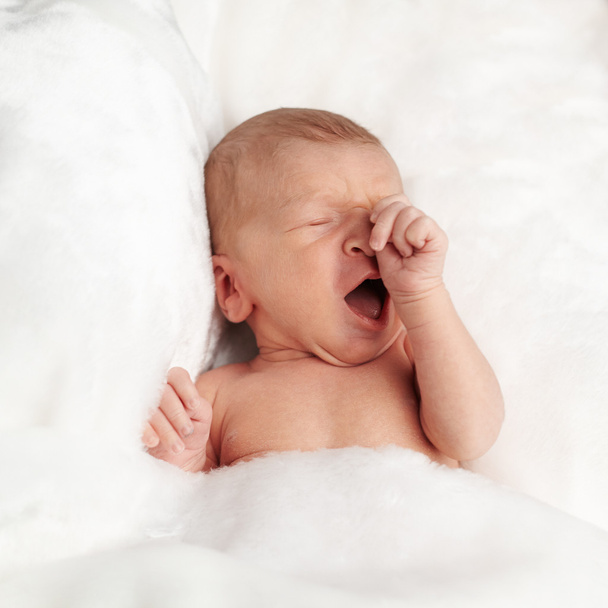 portrait of a cute little newborn baby yawning - Photo, Image