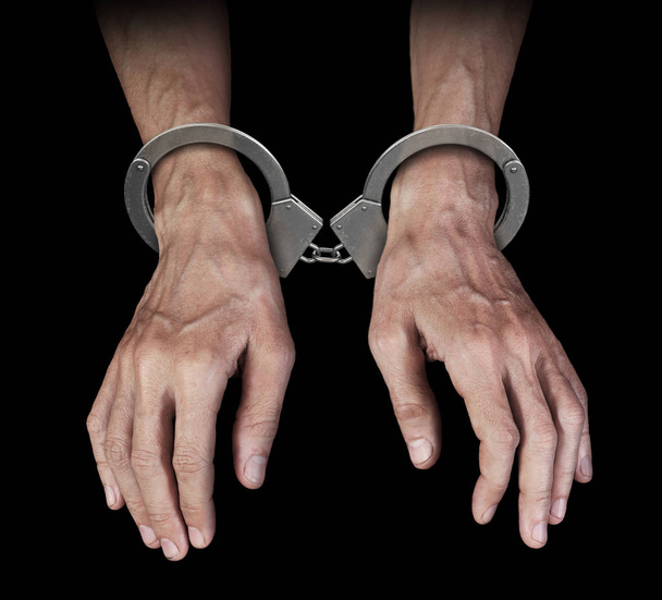 Man's hands in handcuffs - Photo, Image