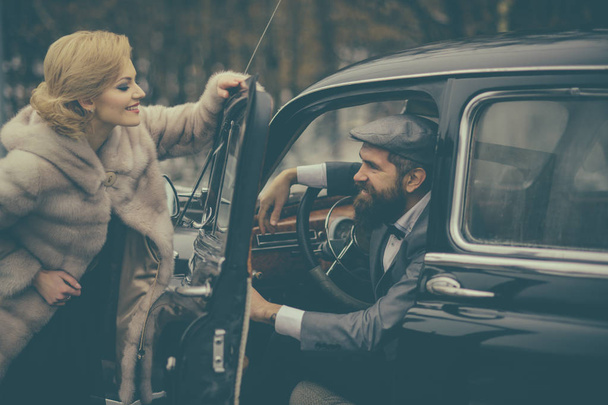 date of happy couple in love. date of couple at retro car - Fotografie, Obrázek