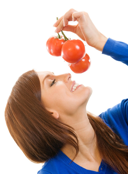 Wesoły kobieta z pomidorami, nad białym - Zdjęcie, obraz