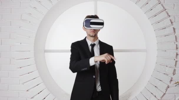 Young Man in Virtual Reality Glasses. VR. Google cardboard - Footage, Video