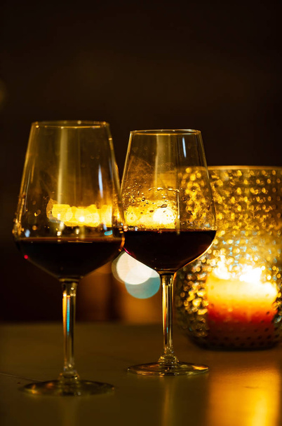red wine and candles, close up - Foto, Bild