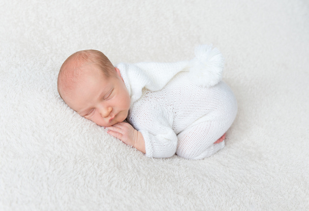 Infant boy in white bodysuit - Fotoğraf, Görsel