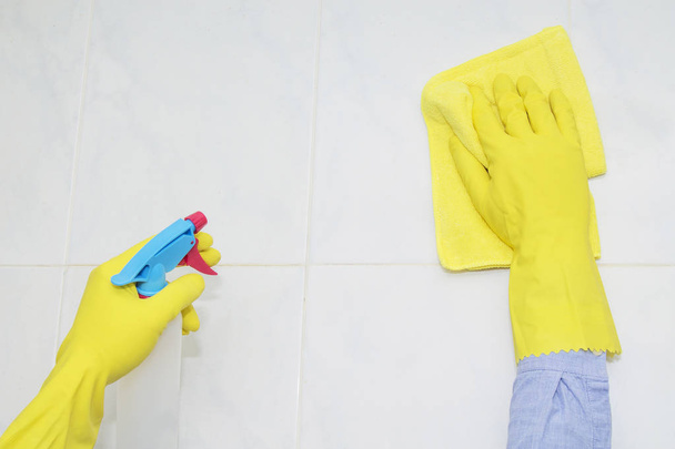 cleaning tiles with cleaning products and disinfectants - 写真・画像