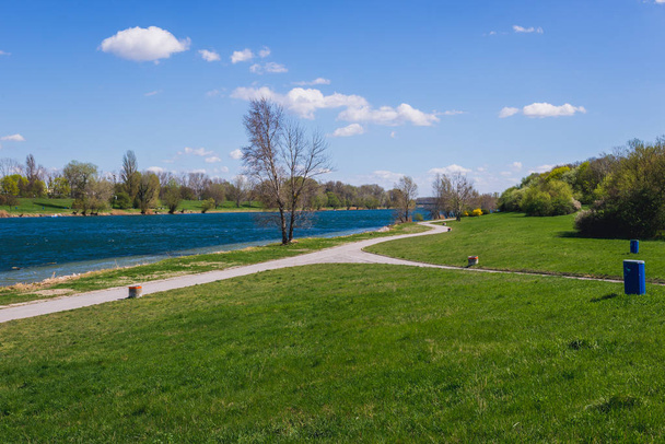Paths on a Danube Island, view with Danube River in Vienna city, capital of Austria - Foto, imagen