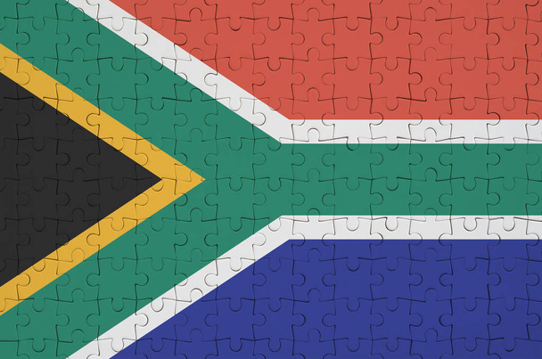 Σημαία της Νότιας Αφρικής απεικονίζεται σε ένα διπλωμένο παζλ - Φωτογραφία, εικόνα