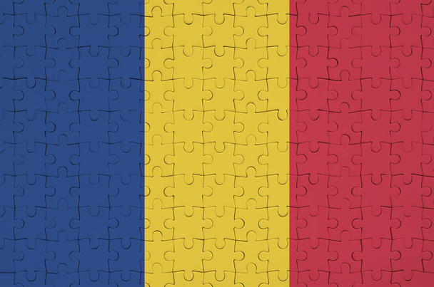 Romania bandiera è raffigurato su un puzzle piegato
 - Foto, immagini