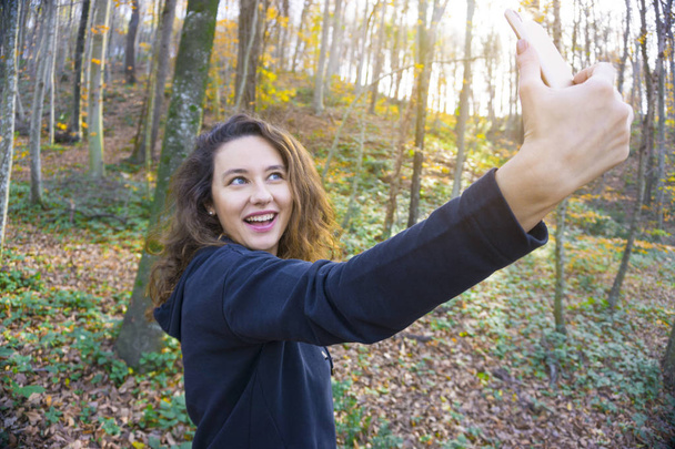 Young woman selfies in nature - Фото, зображення