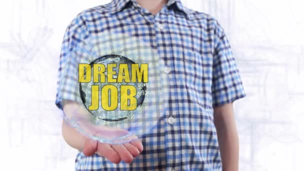 Giovane uomo mostra un ologramma del pianeta Terra e testo Dream job
 - Filmati, video