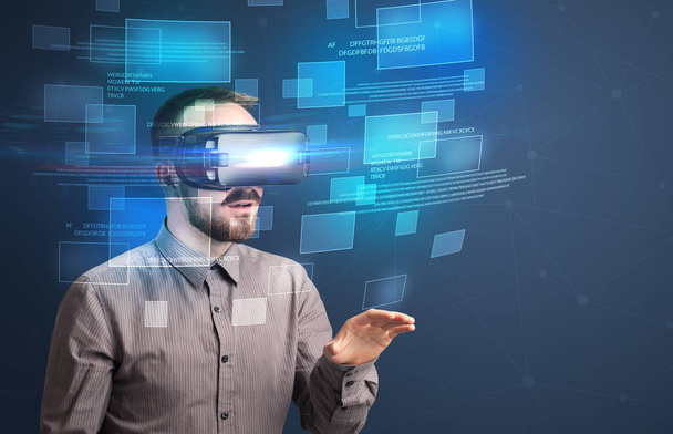 Businessman with virtual reality goggles - Foto, imagen