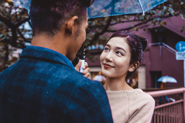 Beautiful happy couple dating in Tokyo - Photo, image