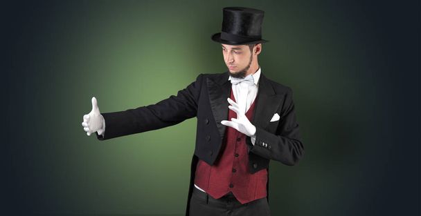 Magician holds something invisible  - Fotografie, Obrázek