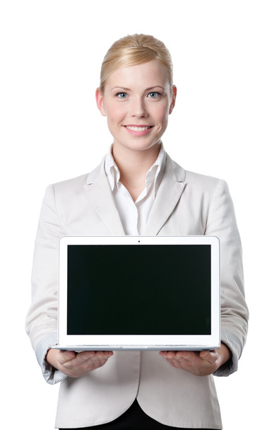 Smiling businesswoman offers computer product - Foto, Imagen