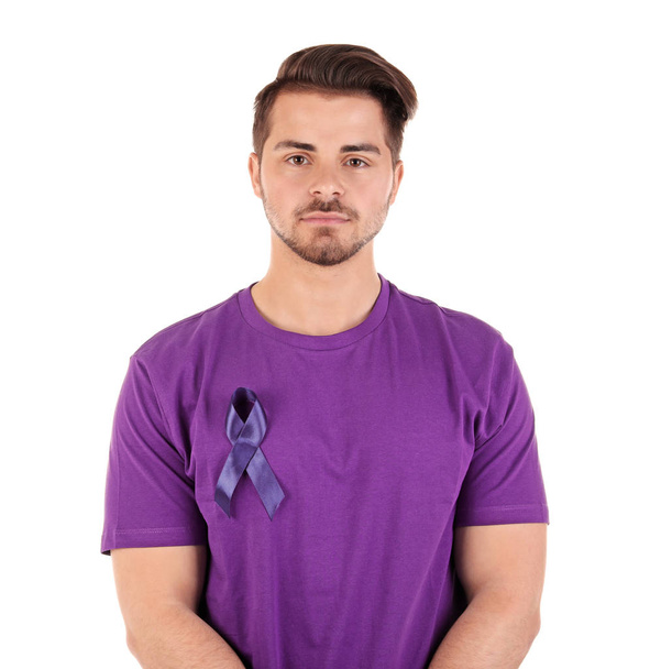 Young man with blue ribbon on white background. Urological cancer awareness - Φωτογραφία, εικόνα