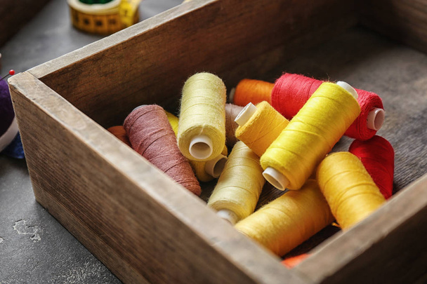 Box with color sewing threads, closeup - Фото, зображення