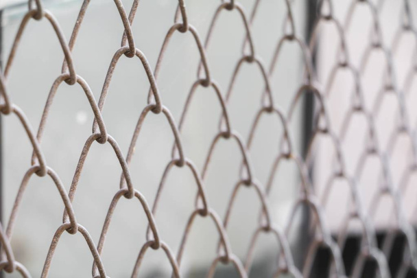 Steel wire mesh on rusty galvanized in Jail, Select focus with shallow depth of field. - Fotografie, Obrázek