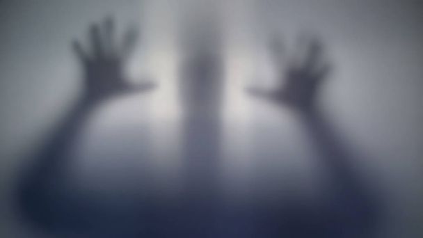 Horrible silhouette behind film, scary supernatural alien, strange creature - Фото, зображення