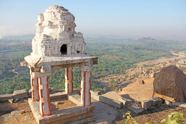 Sunrise in Hampi on Matanga hill. View from above, from the sky, aerophoto.  Indian temple Hampi in the sun. - Photo, Image