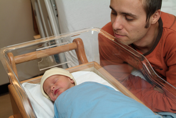 newborn and father in hospital - 写真・画像