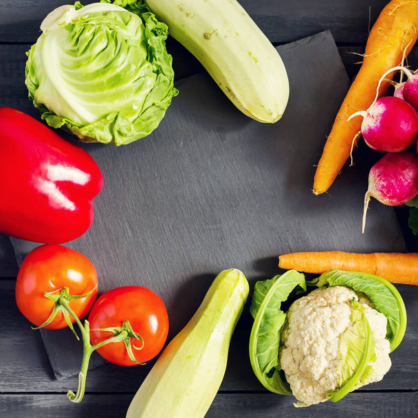 Fresh vegetables. Zucchini, bell pepper, carrots, cabbage, cauliflower, radish, lettuce, tomato Concept of a healthy diet Copy space Natural organic products - Fotoğraf, Görsel