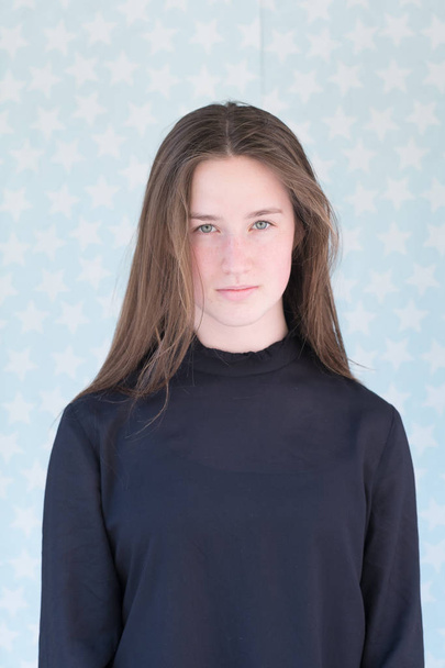 Outdoor portrait of beautiful teenage girl with long hair - Valokuva, kuva