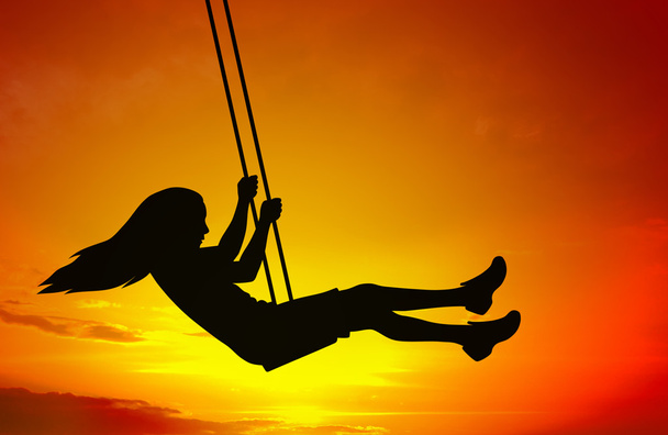 Swinging child - Foto, Bild