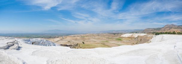 Panoramic view of Pammukale near modern city Denizli, Turkey. One of famous tourists place in Turkey. - Photo, Image
