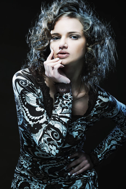 beautiful young woman with curly hair - Φωτογραφία, εικόνα