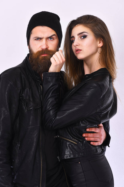 Girl and bearded man in black leather jacket and hat - Foto, Imagem