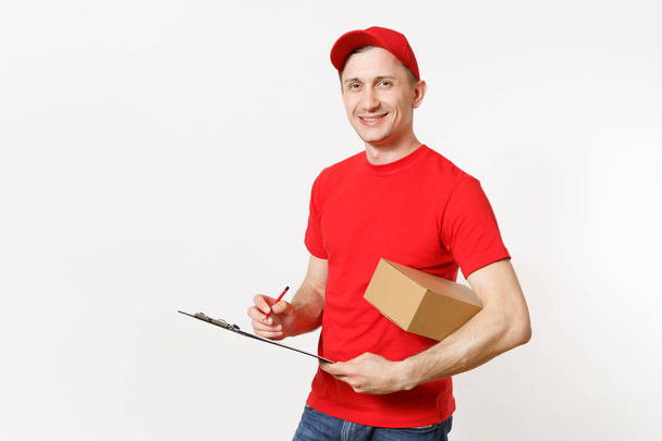 Delivery man in red uniform isolated on white background. Male courier in cap, t-shirt holding pen, clipboard with papers document, blank empty sheet, cardboard box. Receiving package. Copy space - Photo, Image
