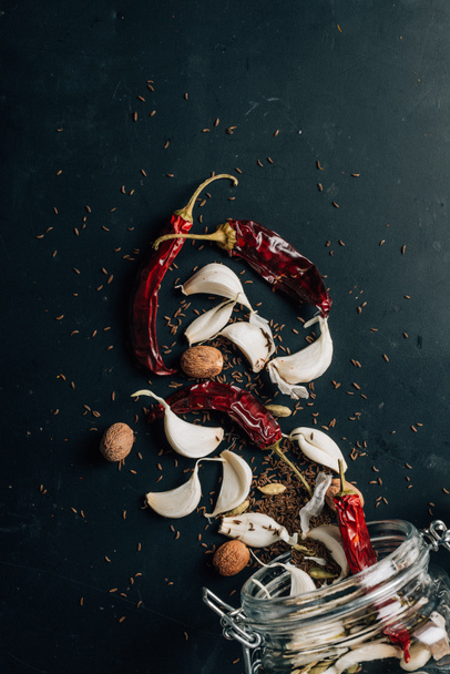 top view of chili peppers and garlic on table - 写真・画像