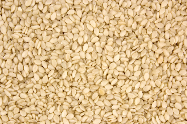 sesame seeds photo background, common ingredient of asian food - Photo, Image