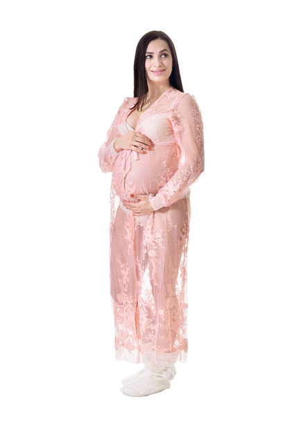 Beautiful pregnant woman posing isolated on white background - Photo, image