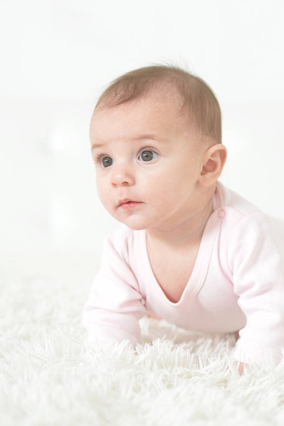 Cute  baby girl  on white  blanket  - Photo, Image