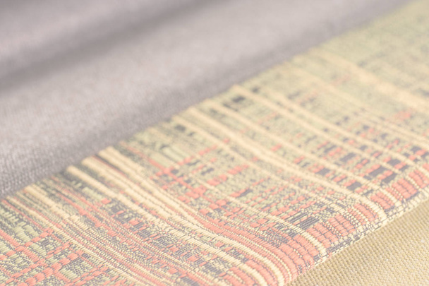 Colorful upholstery fabric samples background. Abstract background, empty template. Selective focus - Фото, зображення