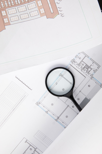 top view of magnifying glass and blueprints, architecture concept  - Fotografie, Obrázek