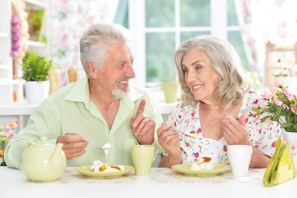 Senior couple having breakfast - Фото, зображення