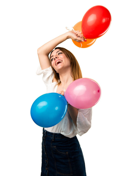 Happy beautiful young girl holding a balloon - Foto, Bild