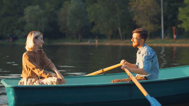 Young couple in a boat on a date on vacation - Fotografie, Obrázek