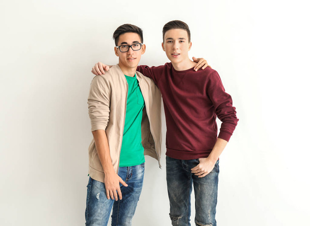 Cool teenage boys on white background - Fotó, kép