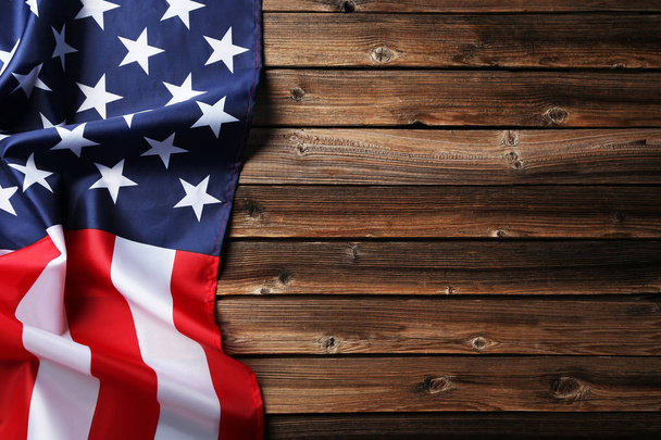 American flag on brown wooden table - Φωτογραφία, εικόνα