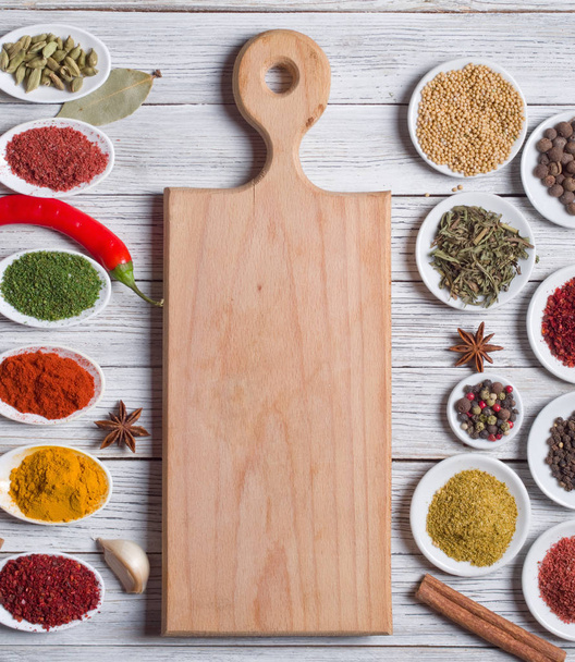 Various spices selection on a wooden background - Photo, Image